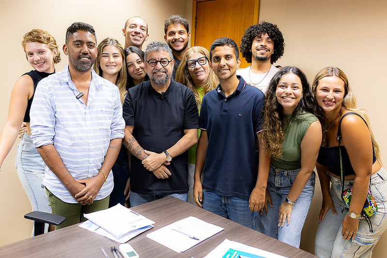 a group of people posing for a photo